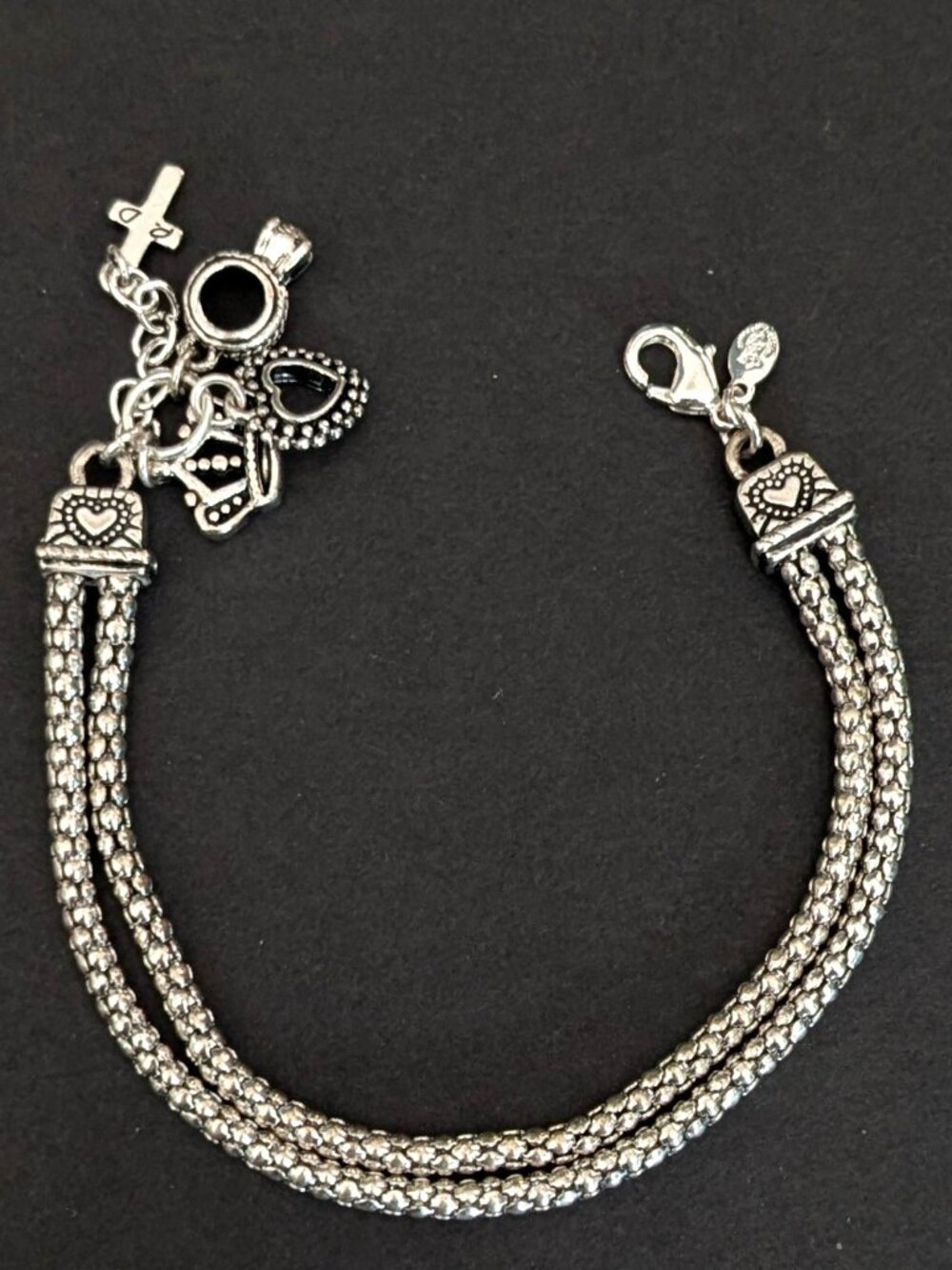 2 strand silver bracelet with charm detail